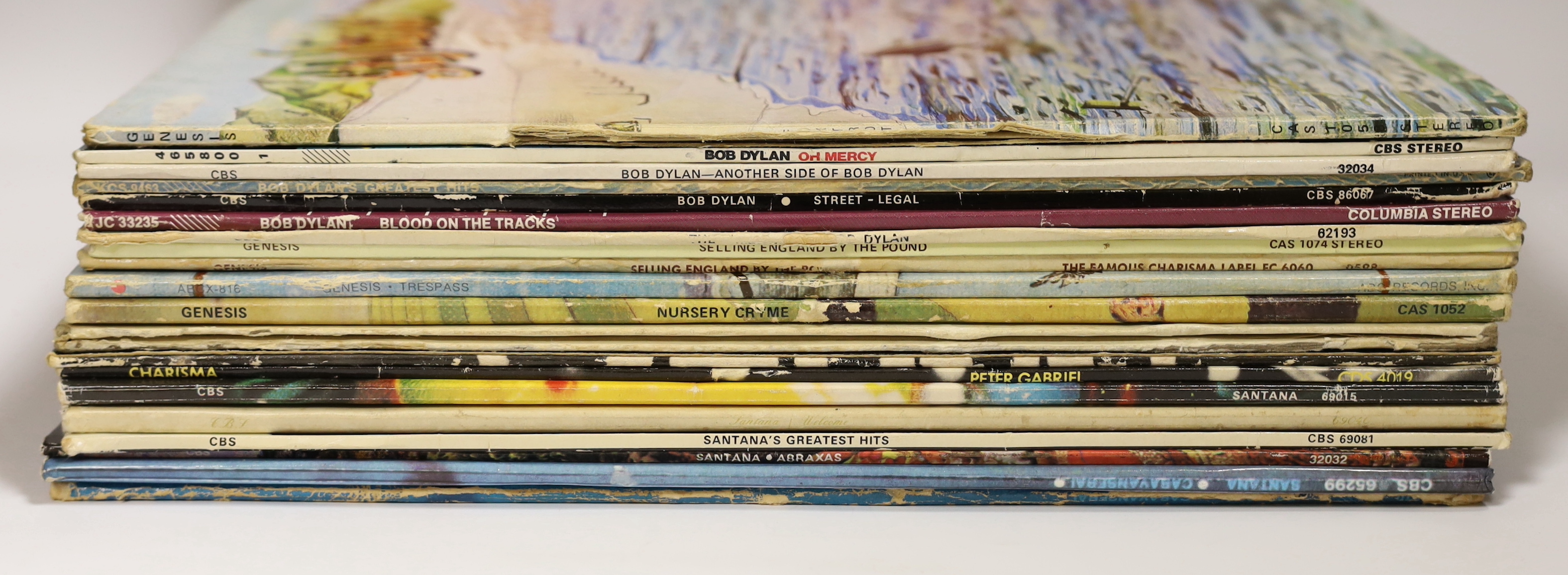 Twenty-three LP albums by Bob Dylan, Genesis, Peter Gabriel and Santana, albums include Blood on the Tracks, Street Legal, Oh, Mercy, Foxtrot, Selling England, by the Pound, Trespass, Nursery, Cryme, The Lamb Lies Down o